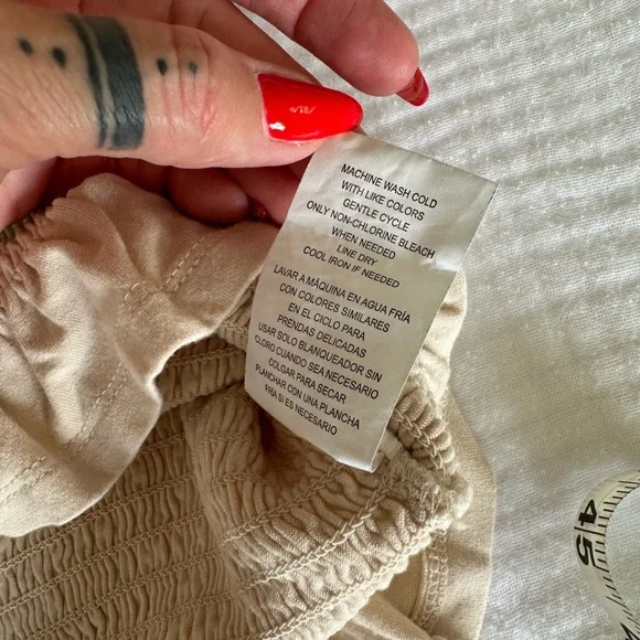 Mason & Belle Smocked Crochet Cap Sleeve Peplum Ruffle Hem Top in Ivory, Large - Picture 9 of 10